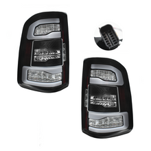 Load image into Gallery viewer, Calaveras RAM 19-23 Laramie Sport, Longhorn y Limited LED negras performance