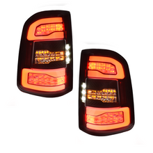 Load image into Gallery viewer, Calaveras RAM 19-23 Laramie Sport, Longhorn y Limited LED negras performance