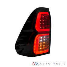 Cargar imagen en el visor de la galería, Calaveras Hilux 16-23 LED negras Performance